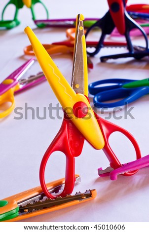 Red and yellow zigzag scissors