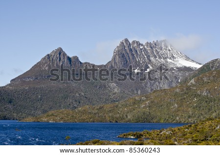 Cradle Mountain with a dusting of snow. Lake St Clair National Park, Tasmania, Australia.