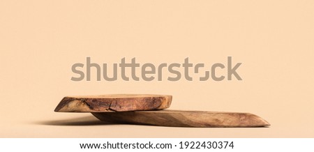 Rustic wood pieces podium. Background for perfume, jewellery and cosmetic products. Front view.