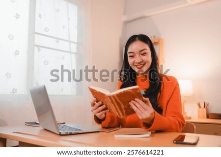 Similar – Image, Stock Photo Cheerful woman reading notebook in office