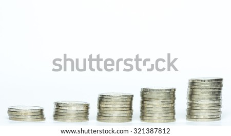 silver coins stack isolated increasing / stable money investment or saving