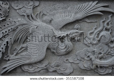 stock-photo-phoenix-marble-carving-wall-