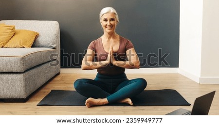 Similar – Image, Stock Photo Senior woman in sportswear jogging through the forest