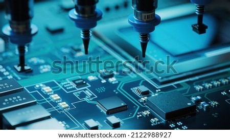 Macro Shot of Generic Printed Circuit board with Chips and other Components During Production Process . Electronics Manufacturing. Dark Environment ストックフォト © 