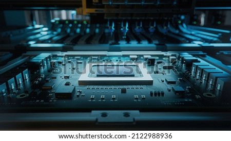 Shot of Generic Printed Circuit board with Microchips and other Components During Production Process. Electronics Manufacturing. Dark Environment 商業照片 © 