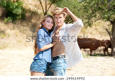 Portrait of happy couple in love on rural farm