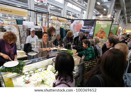 TORINO, ITALY - OCT. 24: People visit local and international food stands at Salone del Gusto, international fair of tastes and slow food on October 24, 2010 in Torino, Italy.