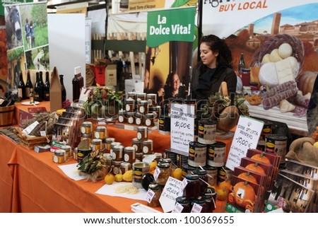 TORINO, ITALY - OCT. 24: People visit local and international food stands at Salone del Gusto, international fair of tastes and slow food on October 24, 2010 in Torino, Italy.