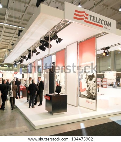 MILAN, ITALY - OCT. 19: People visiting Telecom technologies area during SMAU, international fair of business intelligence and information technology October 19, 2011 in Milan, Italy.