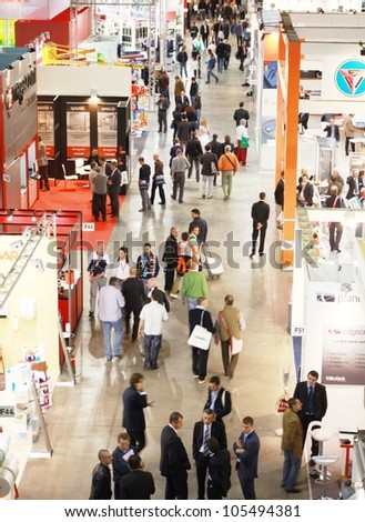 MILAN, ITALY - OCTOBER 08: Panoramic view of people visiting Sfortec 2010, international exhibition of machines, robots, automation and auxiliary technologies October 08, 2010 in Milan, Italy.