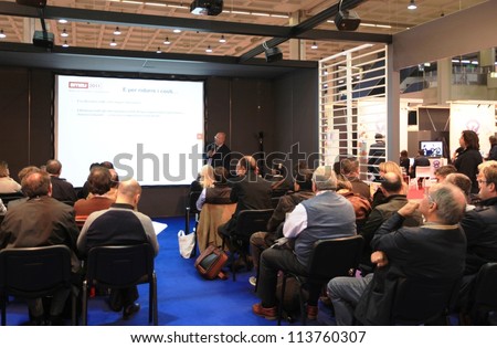 MILAN, ITALY - OCT. 19: People in meeting at SMAU, international fair of business intelligence and information technology October 19, 2011 in Milan, Italy.