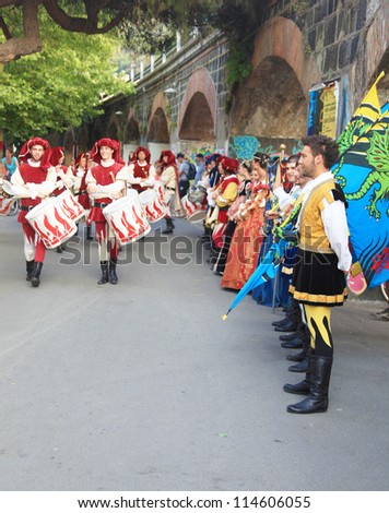 LEVANTO, ITALY - JULY 24: Local people participate to traditional historic parade with customs and flags celebrations during San Giacomo days July 24, 2012 in Levanto, Italy.