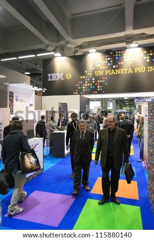 MILAN, ITALY - OCTOBER 17: People visit IBM technologies products area at SMAU, international fair of business intelligence and information technology October 17, 2012 in Milan, Italy.