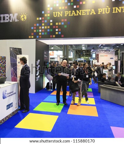 MILAN, ITALY - OCTOBER 17: People at IBM technologies products area at SMAU, international fair of business intelligence and information technology October 17, 2012 in Milan, Italy.