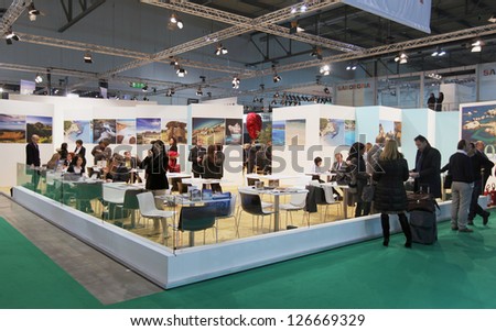 MILAN, ITALY - FEBRUARY 16: People visit Italy tourism exhibition area at BIT, International Tourism Exchange Exhibition on February 16, 2012 in Milan, Italy.