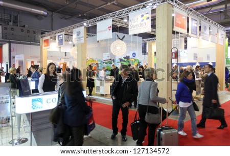 MILAN, ITALY - FEBRUARY 16: People visit international exhibition area during BIT, International Tourism Exchange Exhibition on February 16, 2012 in Milan, Italy.