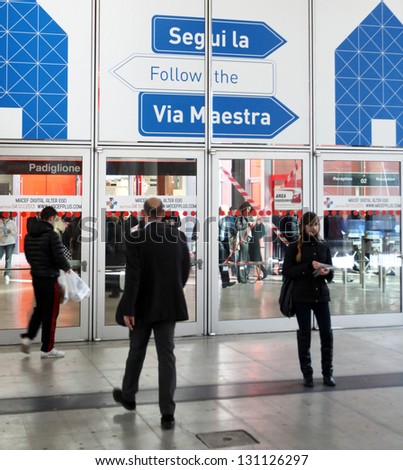 MILAN, ITALY - JAN 24: People enter home accessories and furnishing stands at Macef, International Home Show Exhibition January 24, 2013 in Milan, Italy.