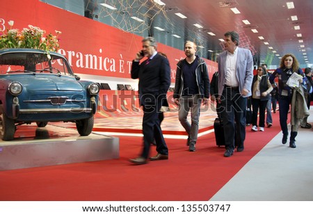 MILAN - APRIL 10: People enter Salone del Mobile, international home furnishing design and accessories exhibition on April 10, 2013 in Milan, Italy.
