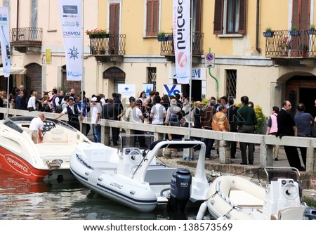 MILAN - APRIL 29: People visit boats showcase opening at NavigaMI Salone Nautico, boat show exhibition in the area of Navigli April 29, 2010 in Milan, Italy.