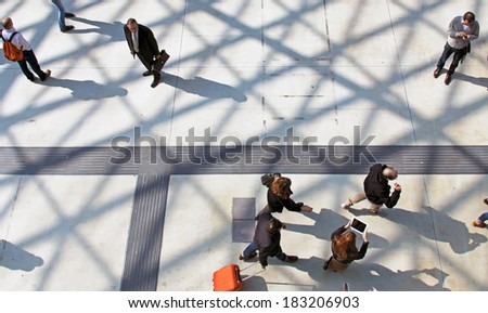 MILANO, ITALY - APRIL 10, 2013: View of people at the entrance of Salone del Mobile, international furnishing accessories exhibition at Rho Fiera Center in Milano, Italy.