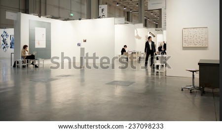 MILANO, ITALY - APRIL 07, 2013: People visit paintings galleries at MiArt, international exhibition of modern and contemporary art in Milano, Italy.