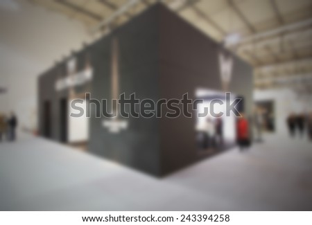 View of a trade show. Intentionally blurred post production.