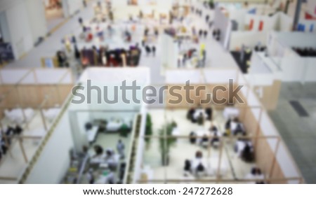 Trade show background, panoramic view. Intentionally blurred post production background.