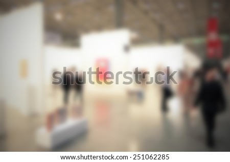 Art gallery generic background. Intentionally blurred editing post production. People, works and location not recognizable.