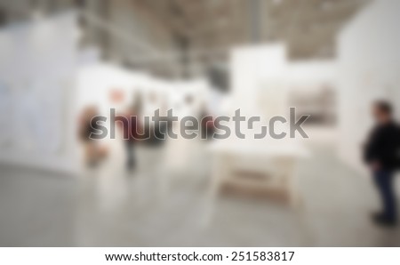 Art gallery generic background. Intentionally blurred editing post production. People, works and location not recognizable.
