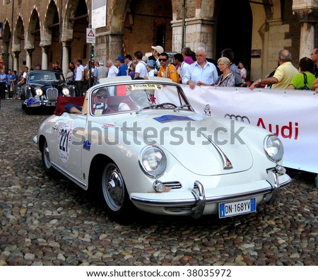 MANTUA, ITALY - SEPT. 18: A 1961 Porsche 356 B parades at a veteran cars event Gran Premio Nuvolari in honor of famous Italian car champion Tazio Nuvolari September 18, 2009 in Mantua, Italy.