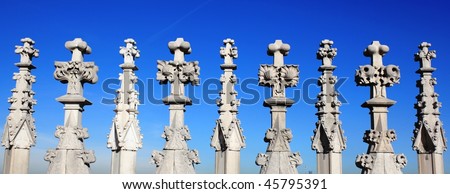 Gothic architecture details, blue sky background