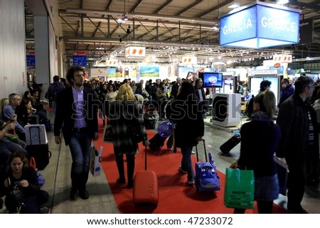 MILAN, ITALY - FEBRUARY 20: People walk trough Greece stand at BIT, International Tourism Exchange Exhibition February 20, 2010 in Milan, Italy.