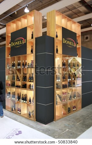 VERONA - APRIL 08: People at Donelli wines stand at Vinitaly, international wine and spirits exhibition April 08, 2010 in Verona, Italy.