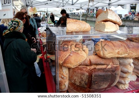 MILAN, ITALY - APRIL 11: Hand made bread at the annual Flowers Market in the fashion and culture Navigli area April 11, 2010 in Milan, Italy.