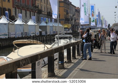 MILAN - APRIL 29: People look boat exhibition at NavigaMI Salone Nautico, boat show exhibition in the area of Navigli April 29, 2010 in Milan, Italy.