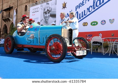 MANTUA, ITALY - SEPTEMBER 19: A 1927 Amilcar Compressor parades at a veteran cars event Gran Premio Nuvolari in honor of famous Italian car champion Tazio Nuvolari September 19, 2010 in Mantua, Italy.