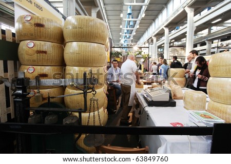 TORINO, ITALY - OCT. 24: Parmigiano Reggiano cheese in exhibition at Salone del Gusto, international fair of tastes and slow food on October 24, 2010 in Torino, Italy.