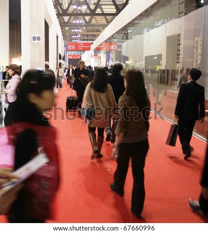 MILAN - APRIL 15: People entering Salone del Mobile, international furnishing accessories exhibition April 15, 2010 in Milan, Italy.