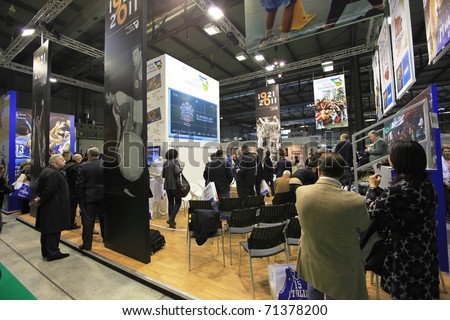 MILAN, ITALY - FEBRUARY 17: People visiting regional stand at BIT, International Tourism Exchange Exhibition on February 17, 2011 in Milan, Italy.