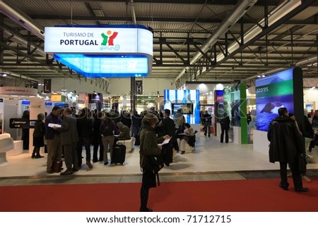 MILAN, ITALY - FEBRUARY 17: People visit the Portugal tourism stand the World pavilion at BIT, International Tourism Exchange Exhibition on February 17, 2011 in Milan, Italy.