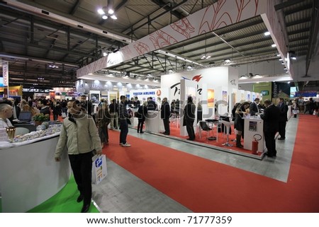MILAN, ITALY - FEBRUARY 17: People visit the World tourism pavilion at BIT, International Tourism Exchange Exhibition on February 17, 2011 in Milan, Italy.
