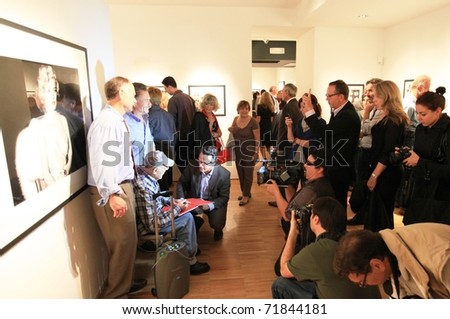 MILAN, ITALY - JUNE 16: Phil Stern with people and photographers at On the scene collection opening at Forma Photography Foundation June 16, 2010 in Milan, Italy.