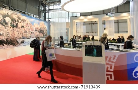 MILAN, ITALY - FEBRUARY 17: People visit tourism stands at Italy showtrade pavilion during BIT, International Tourism Exchange Exhibition on February 17, 2011 in Milan, Italy.