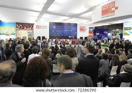 MILAN, ITALY - FEBRUARY 17: Crowd at conference meeting, Piemonte regional stand, BIT, International Tourism Exchange Exhibition on February 17, 2011 in Milan, Italy.