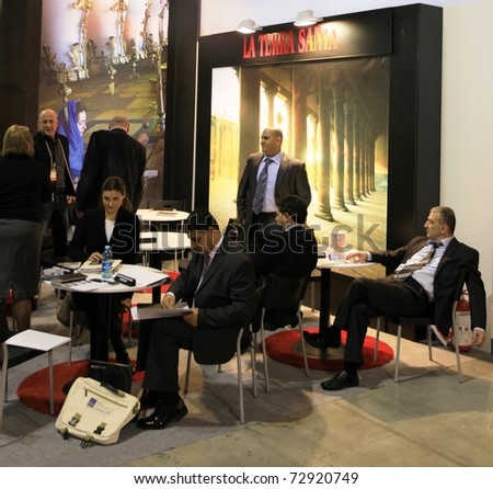 MILAN, ITALY - FEBRUARY 17: Meeting at stand, World pavilion at BIT, International Tourism Exchange Exhibition on February 17, 2011 in Milan, Italy.
