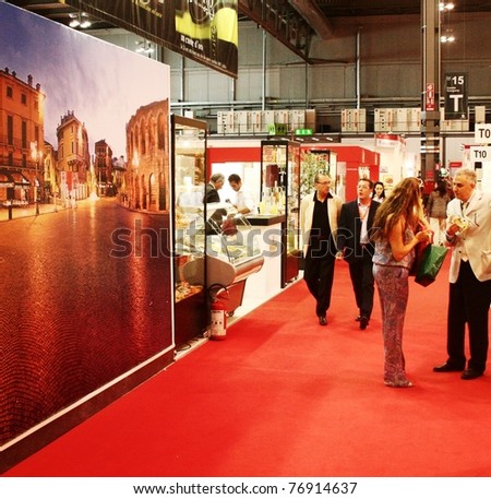MILAN, ITALY - MAY 10: People visit regional and local food productions stands at Tuttofood 2009, World Food Exhibition May 10, 2011 in Milan, Italy.