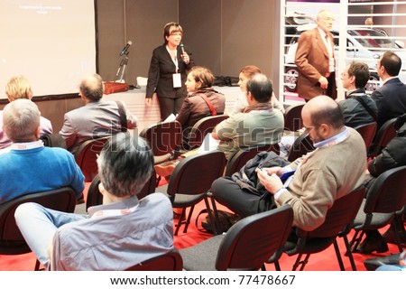 MILAN, ITALY - OCT. 21: People assist to tech conference at SMAU, national fair of business intelligence and information technology October 21, 2009 in Milan, Italy.
