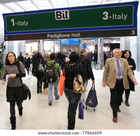 MILAN, ITALY - FEBRUARY 20: People visit Italy tourism pavilions during BIT, International Tourism Exchange Exhibition on February 20, 2011 in Milan, Italy.