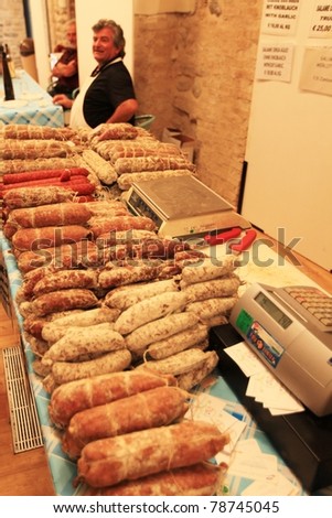MANTOVA, ITALY - JUNE 14: Local salami in exhibition at Golosaria, national fair of food and gastronomy culture June 14, 2010 in Mantova, Italy.