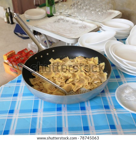 MANTOVA, ITALY - JUNE 14: Typical local pumpkin tortelli pasta at Golosaria, national fair of food and gastronomy culture June 14, 2010 in Mantova, Italy.
